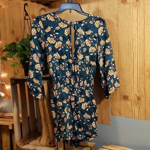 FOREVER 21 CONTEMPORARY ONE PIECE plunged neckline